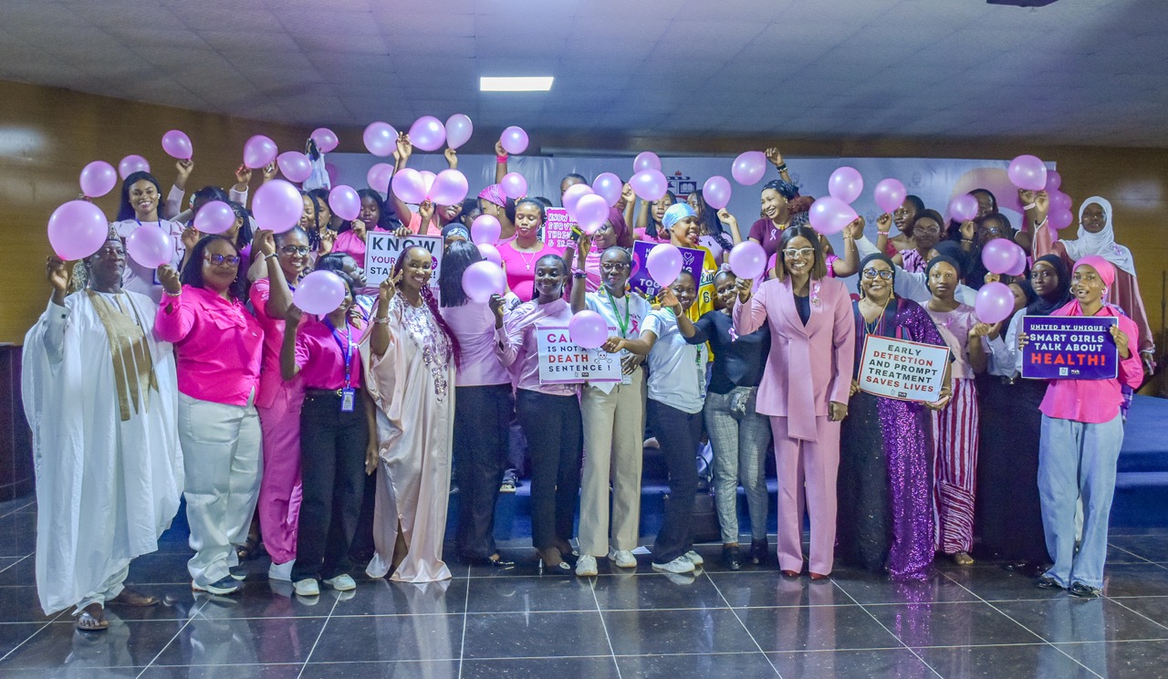 Participants, partners, and survivors at a Heartsmiles cancer awareness gathering.